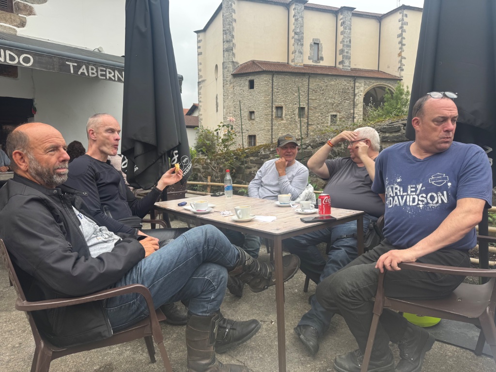 Wild Roads group at taberna terrace coffee stop Basque Country — Picos & Pyrenees May 2026
