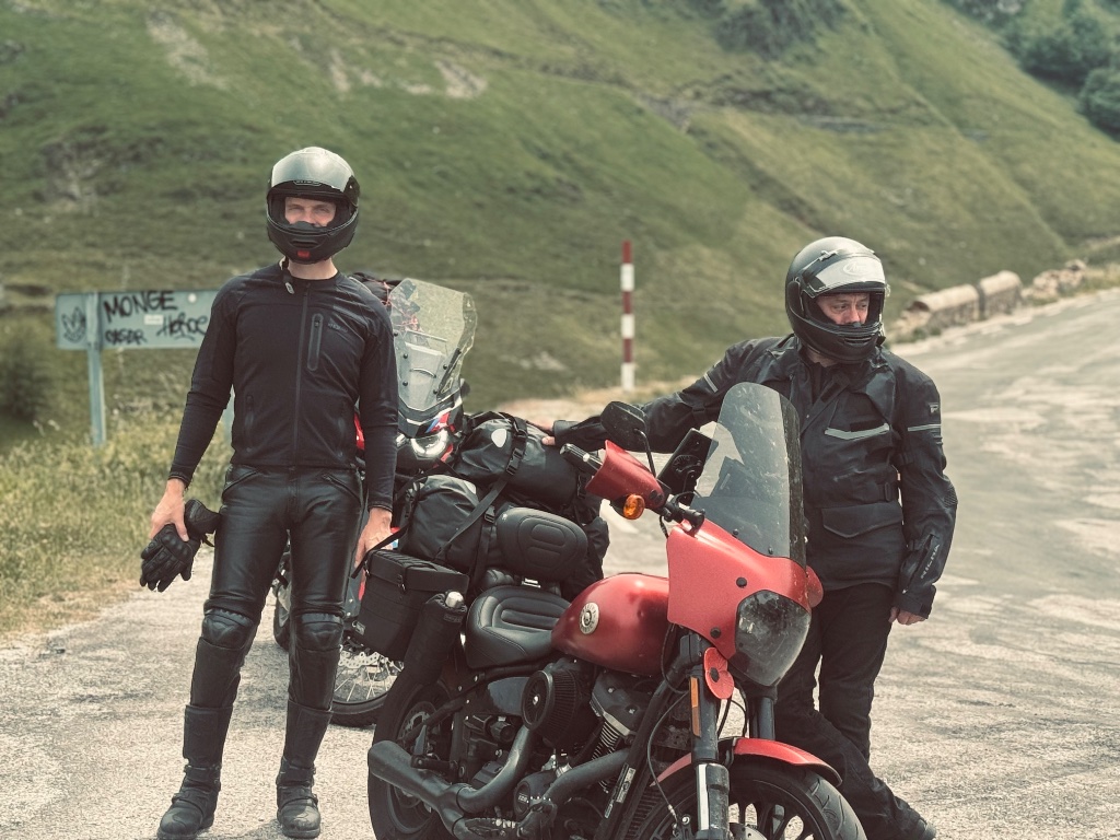 Two riders helmeted at Monge col Pyrenees red Harley — Picos & Pyrenees May 2026