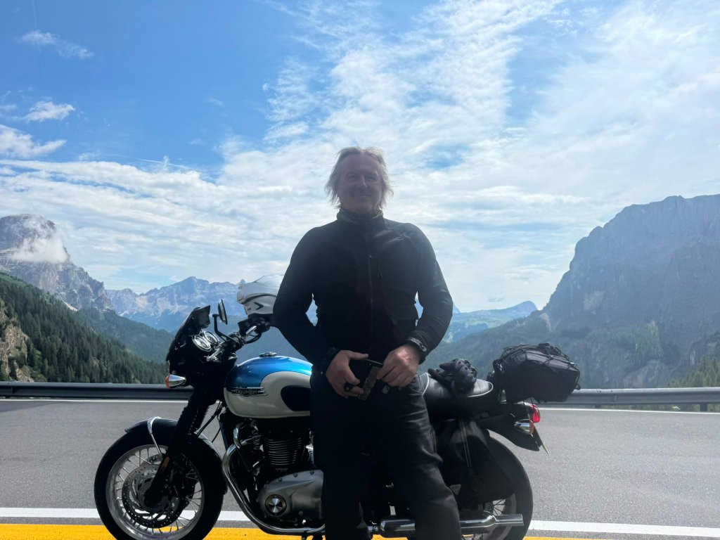 Panoramic view from the summit of Passo Gardena — Twisties &amp; Tuscan Sun July 2026