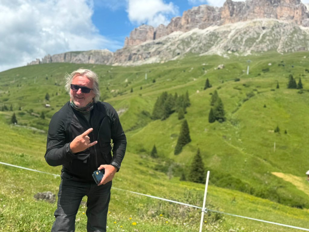 Wild Roads riders enjoying alpine scenery at Passo Gardena — Twisties &amp; Tuscan Sun July 2026