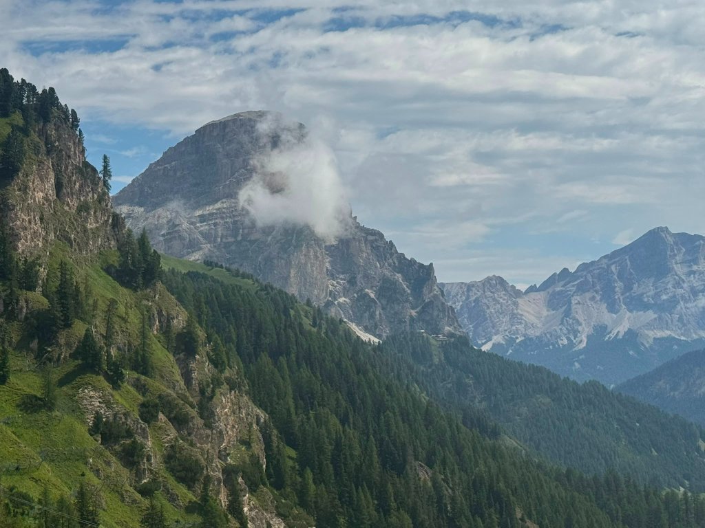 Group relaxing at Passo Campolongo — Twisties &amp; Tuscan Sun July 2026