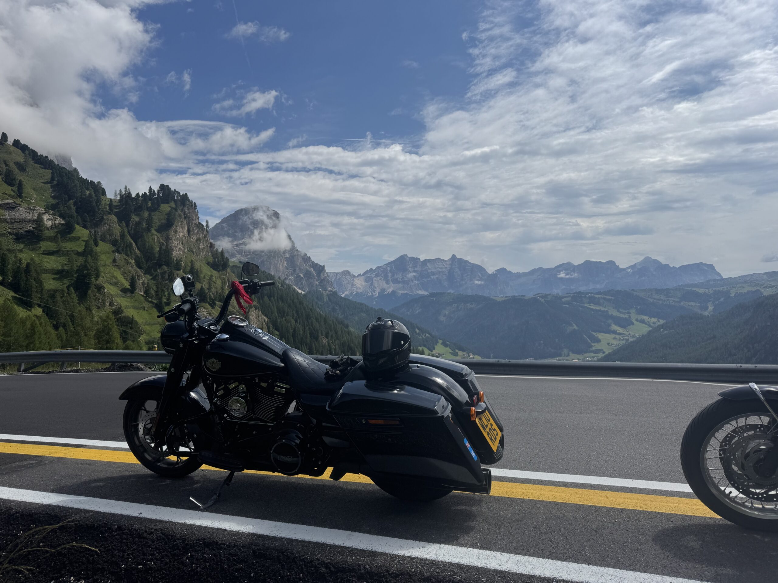 Touring bikes lined up at Passo Campolongo — Twisties &amp; Tuscan Sun July 2026
