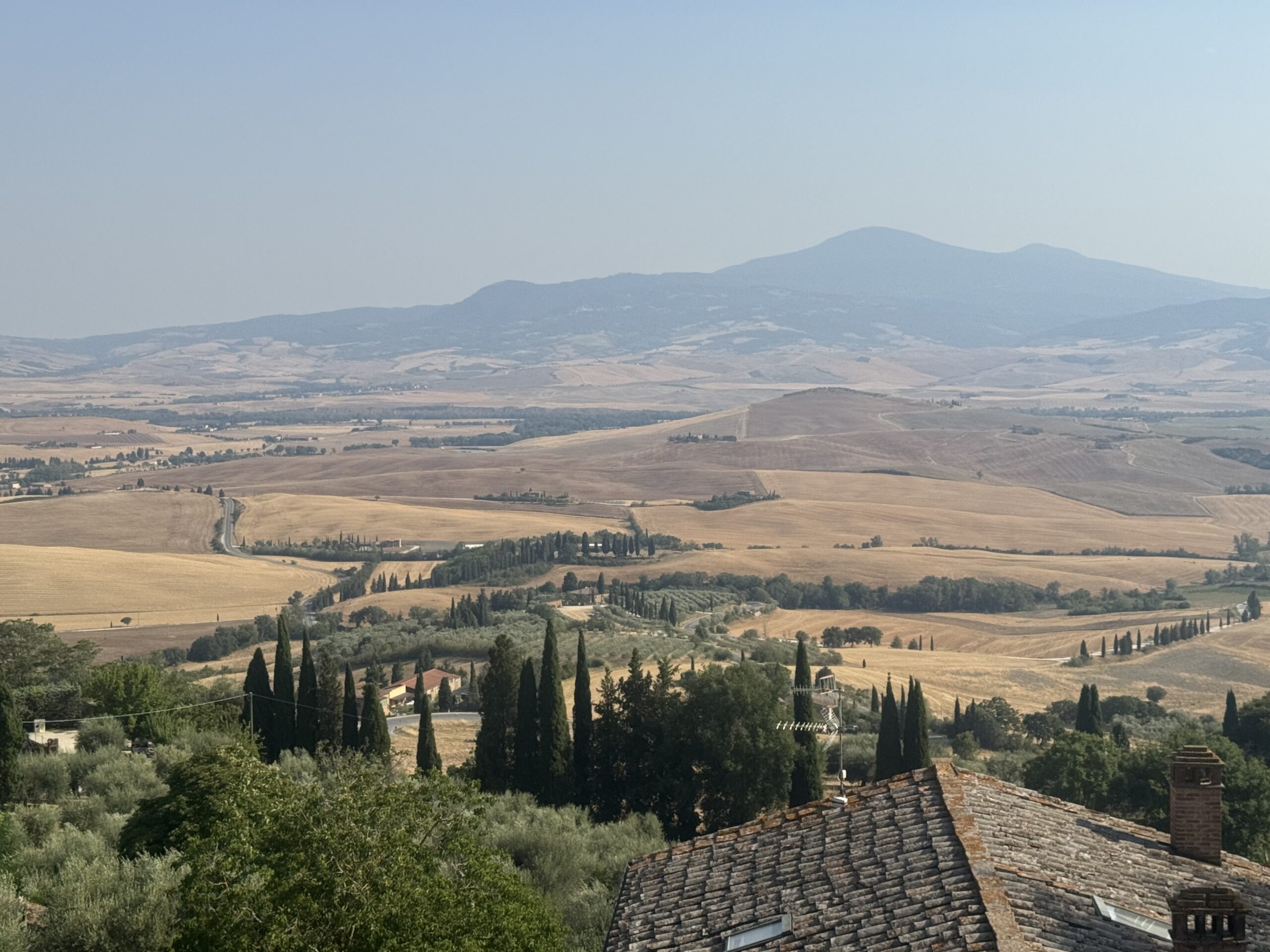 Group enjoying sunset views over Pienza