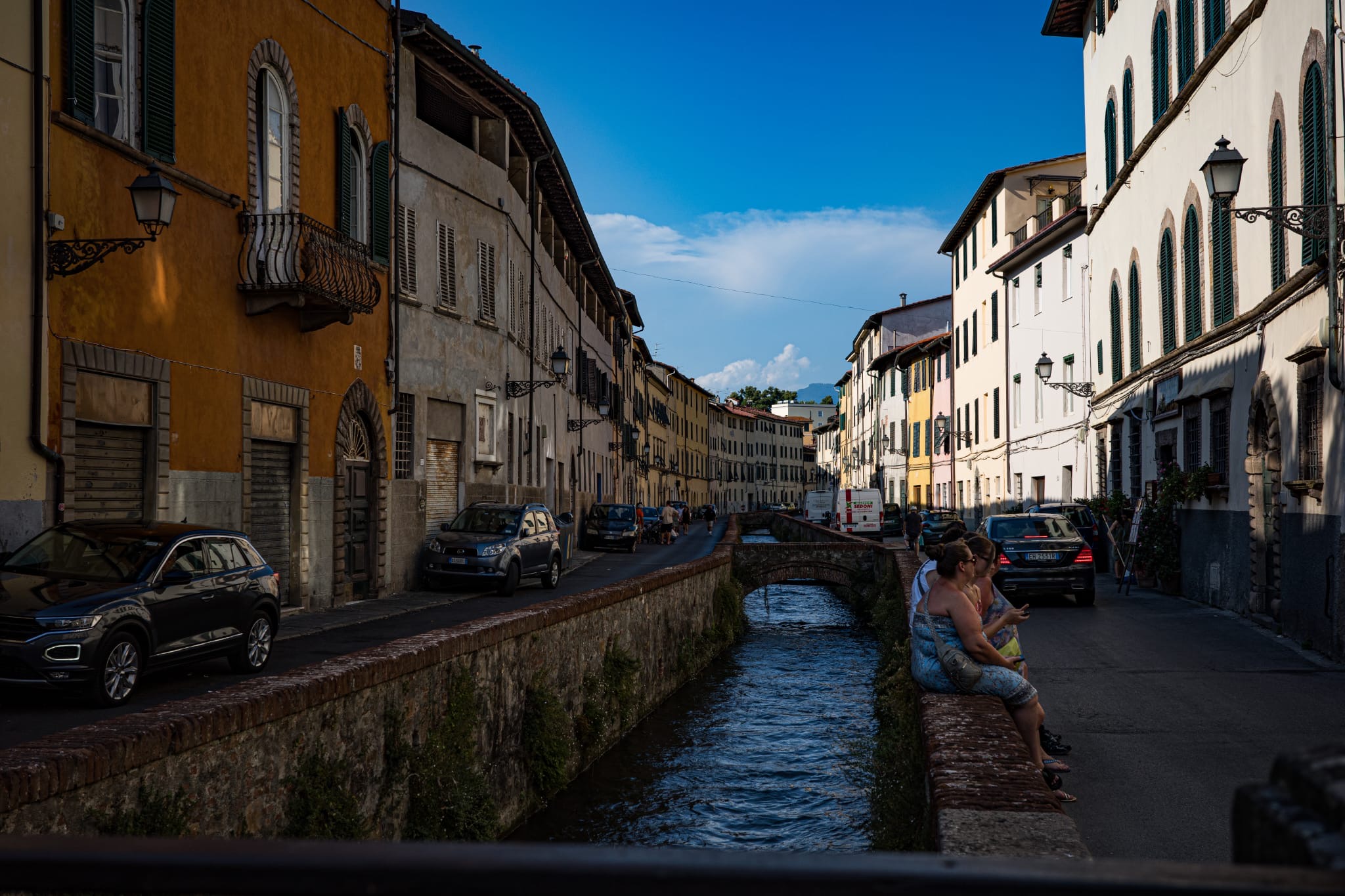 Final stop: Lucca. Riding the tree-lined walls on two wheels is the perfect end to the run. — Twisties & The Tuscan Sun July 2026