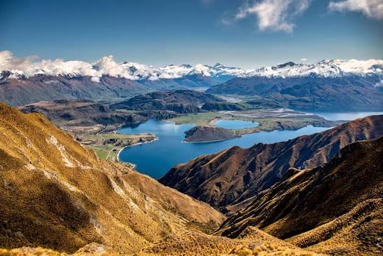 Aerial view over Lake Wanaka and the Southern Alps from Roys Peak, New Zealand — Road To Aotearoa Trailblazer Expedition — Wild Roads