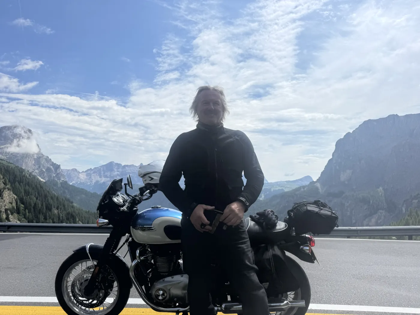 Blue skies over the mountains — Twisties & The Tuscan Sun July 2026 motorcycle tour