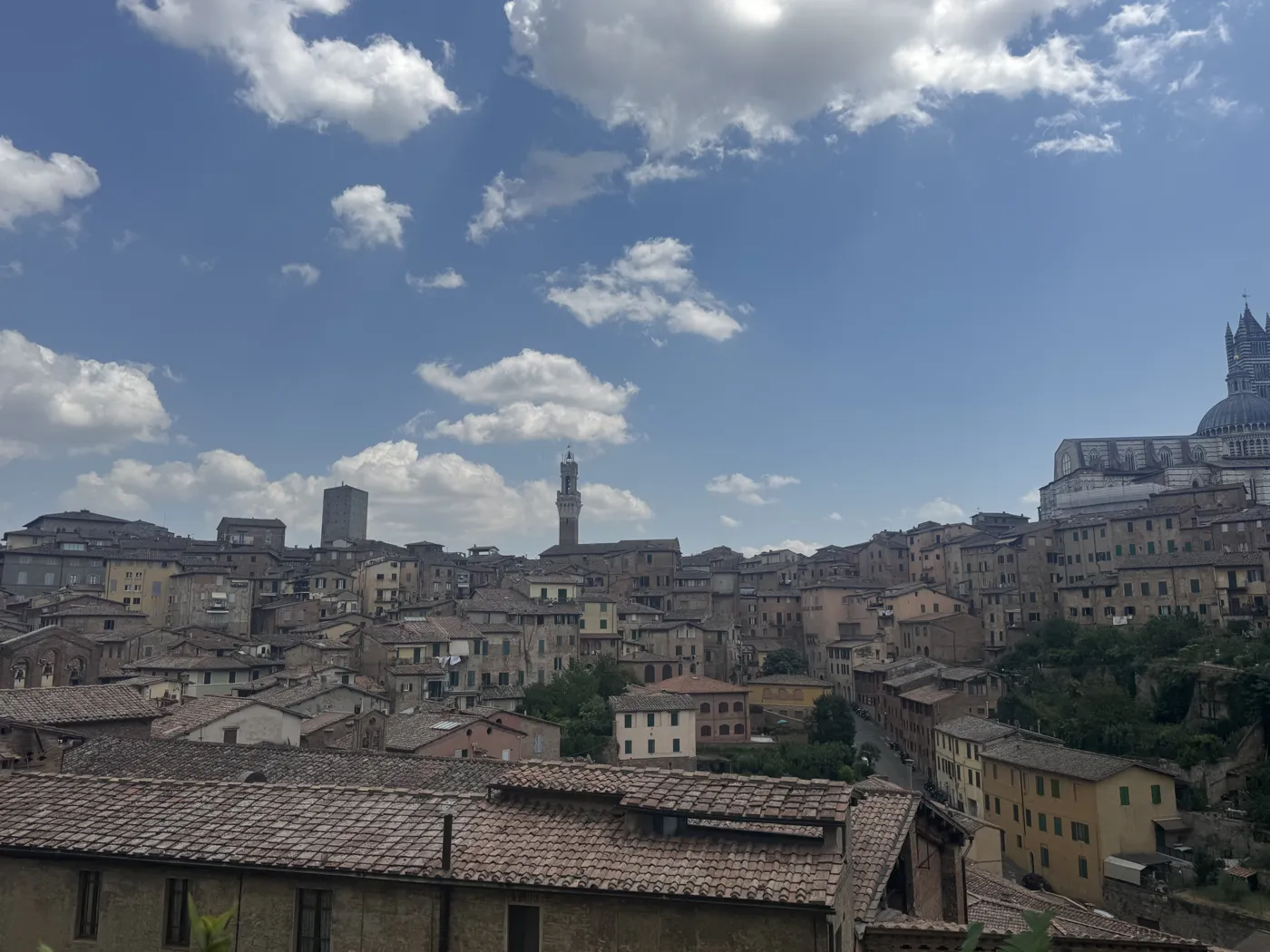 Blue skies over the mountains — Twisties & The Tuscan Sun July 2026 motorcycle tour