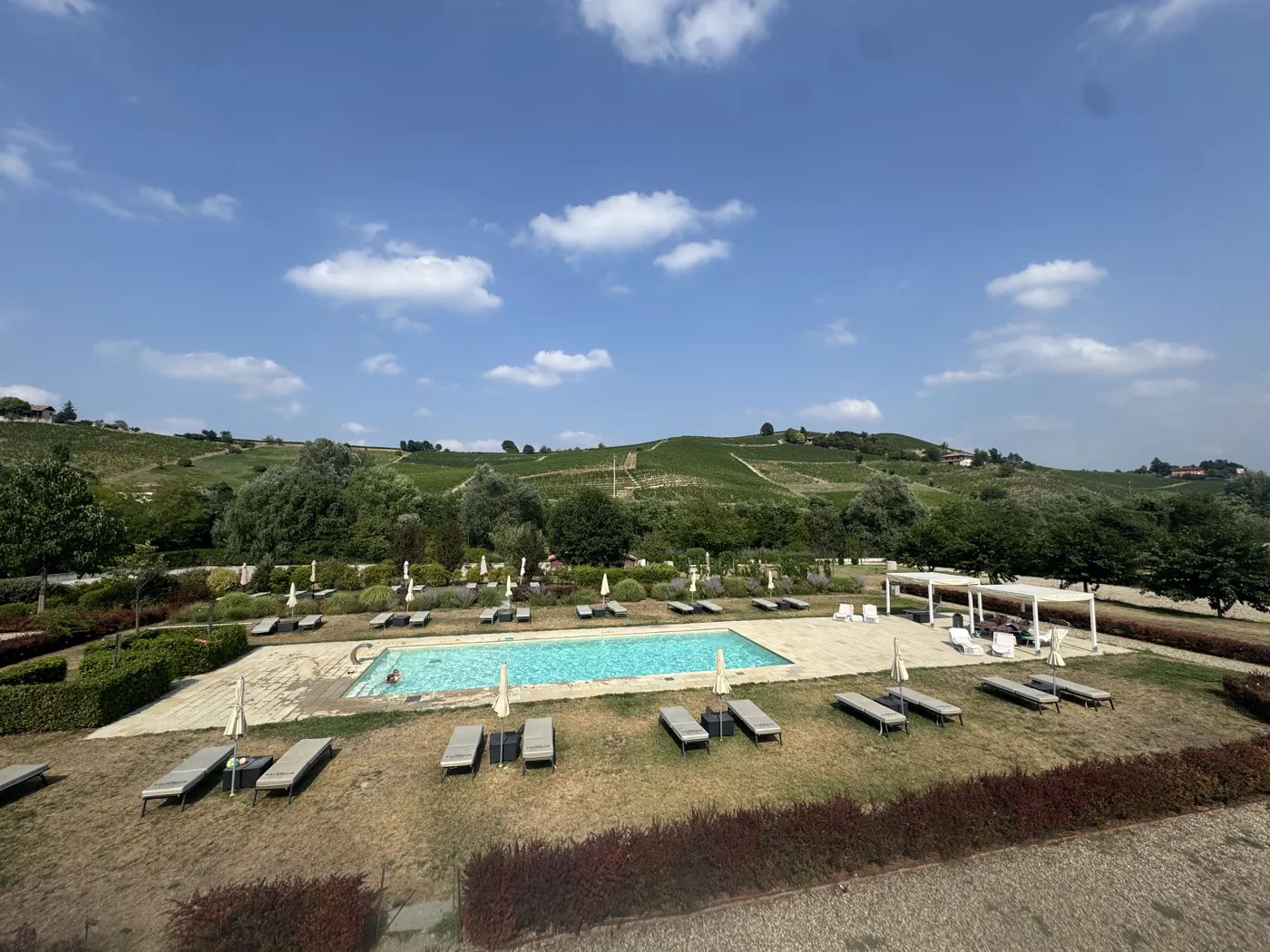 Blue skies over the mountains — Twisties & The Tuscan Sun July 2026 motorcycle tour