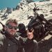 Josh on a Harley-Davidson on an Alpine pass summit — Twisties & Tuscan Sun guided motorcycle tour Italy — Wild Roads Motorcycle Tours